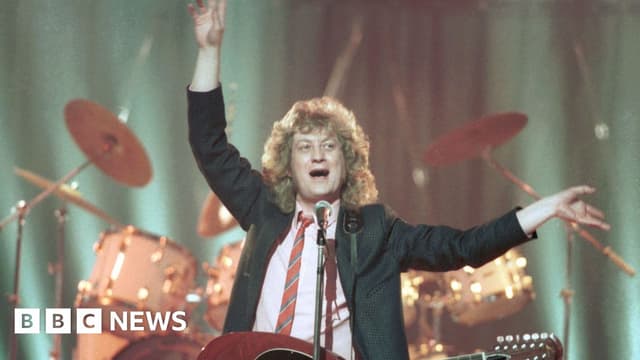 Noddy Holder 'avoids restaurants on Christmas' due to Slade song - BBC News - Featured Image